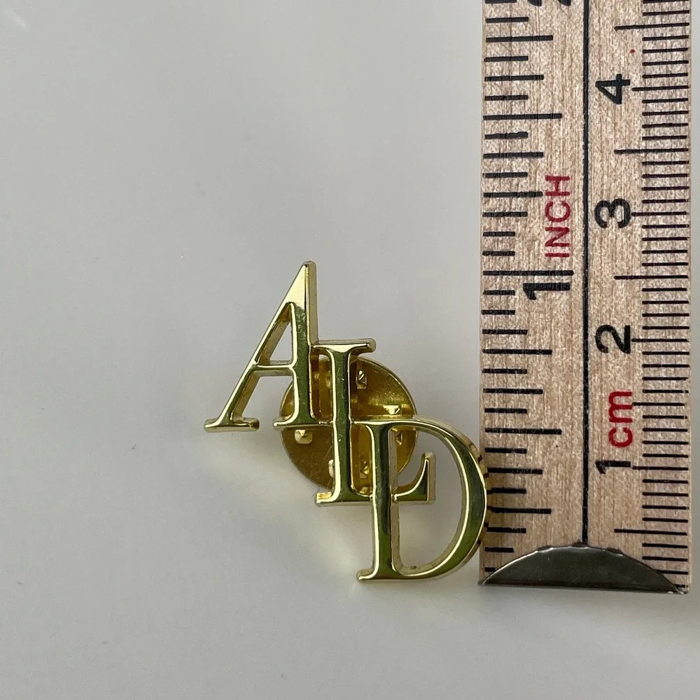 Aime Leon Dore ALD Gold Tone Monogram Lapel Pin Streetwear Suit Accessory NYC